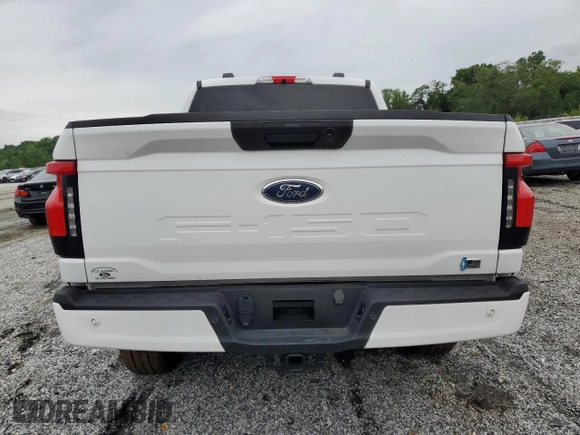 2023 Ford F-150 Lightning Pro z VIN 1FTVW1ELXPWG63466, wystawiony jako Copart lot #59163895 z przebiegiem Nie podano mil oraz Szkody całkowita. Historia ofert i sprzedaży dostępna na DreamBid. Obrazek 6.