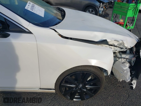 2022 Mazda 3 2.5 Turbo with VIN 3MZBPBAY2NM311824, listed as a IAAI auction lot 41038030 with 21,669 mi miles and . Bid and sale history available at DreamBid. Image 20.