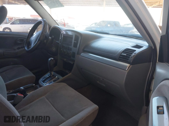 2003 Suzuki Grand Vitara z VIN JS3TD62V434101747, wystawiony jako IAAI lot #42522290 z przebiegiem 230 837 mil mil oraz . Historia ofert i sprzedaży dostępna na DreamBid. Obrazek 5.