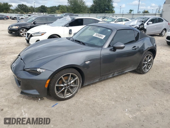 2023 Mazda MX-5 Miata Grand Touring with VIN JM1NDAM7XP0558827, listed as a Copart auction lot 79390864 with 14,901 mi miles and Salvage title. Bid and sale history available at DreamBid. Image 1.