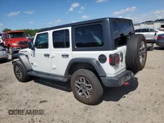 2018 Jeep Wrangler Unlimited Rubicon z VIN 1C4HJXFN3JW176213, wystawiony jako Copart lot #53963755 z przebiegiem 53 094 mil mil oraz Szkoda całkowita • Salvage title. Historia ofert i sprzedaży dostępna na DreamBid. Obrazek 2.