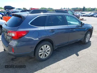2015 Subaru Outback Premium with VIN 4S4BSACC6F3237044, listed as a IAAI auction lot 42141368 with 135,309 mi miles and . Bid and sale history available at DreamBid. Image 4.