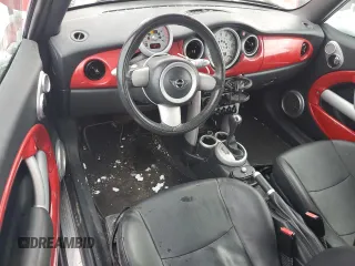 2005 MINI Convertible z VIN WMWRF33405TG11092, wystawiony jako Copart lot #84762004 z przebiegiem 94 895 mil mil oraz Szkoda całkowita • Salvage title. Historia ofert i sprzedaży dostępna na DreamBid. Obrazek 8.