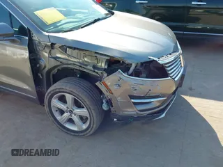 2016 Lincoln MKC Premier with VIN 5LMCJ1D98GUJ21055, listed as a IAAI auction lot 41747502 with 101,956 mi miles and . Bid and sale history available at DreamBid. Image 6.