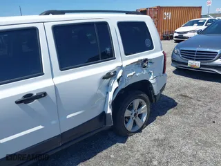 2016 Jeep Patriot Latitude with VIN 1C4NJRFB7GD718468, listed as a IAAI auction lot 42065343 with 92,009 mi miles. Bid and sale history available at carsss.com. Image 6.