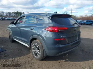 2021 Hyundai Tucson Sport with VIN KM8J3CAL6MU389601, listed as a IAAI auction lot 40985601 with 66,013 mi miles. Bid and sale history available at carsss.com. Image 3.