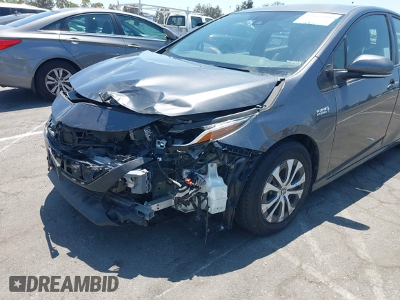 2021 Toyota Prius LE with VIN JTDKAMFPXM3170372, listed as a IAAI auction lot 42661609 with 47,977 mi miles and . Bid and sale history available at DreamBid. Image 6.