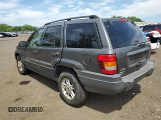 2004 Jeep Grand Cherokee Laredo with VIN 1J4GW48S64C291404, listed as a Copart auction lot 62835335 with 170,365 mi miles and Salvage title. Bid and sale history available at DreamBid. Image 2.