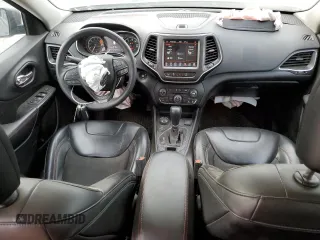 2021 Jeep Cherokee Trailhawk with VIN 1C4PJMBX7MD215581, listed as a Copart auction lot 51281205 with 62,199 mi miles and Salvage title. Bid and sale history available at DreamBid. Image 8.
