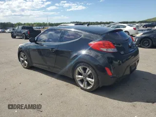 2013 Hyundai Veloster w/Gray Int z VIN KMHTC6ADXDU092253, wystawiony jako Copart lot #57708055 z przebiegiem 141 904 mil mil oraz Tytuł czysty. Historia ofert i sprzedaży dostępna na DreamBid. Obrazek 2.