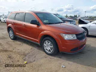 2014 Dodge Journey SE with VIN 3C4PDCAB8ET136794, listed as a IAAI auction lot 41986986 with 142,080 mi miles and . Bid and sale history available at carsss.com. Image 1.