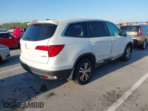 2017 Honda Pilot EX-L with VIN 5FNYF6H54HB015814, listed as a IAAI auction lot 41955743 with 122,389 mi miles and . Bid and sale history available at DreamBid. Image 4.