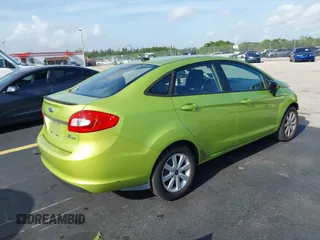 2011 Ford Fiesta SE z VIN 3FADP4BJ3BM181711, wystawiony jako IAAI lot #42492104 z przebiegiem 102 667 mil mil oraz . Historia ofert i sprzedaży dostępna na DreamBid. Obrazek 4.