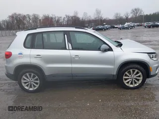 2017 Volkswagen Tiguan S with VIN WVGBV7AX4HK051172, listed as a IAAI auction lot 41843182 with 160,010 mi miles and . Bid and sale history available at DreamBid. Image 14.