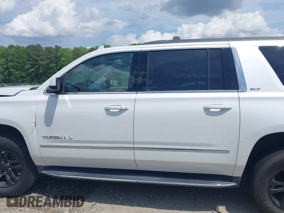 2017 GMC Yukon XL SLT z VIN 1GKS2GKC5HR160468, wystawiony jako IAAI lot #42166908 z przebiegiem 131 469 mil mil oraz . Historia ofert i sprzedaży dostępna na DreamBid. Obrazek 14.