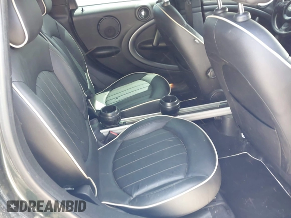 2012 MINI Countryman S z VIN WMWZC3C5XCWM26655, wystawiony jako IAAI lot #42083045 z przebiegiem 156 558 mil mil oraz . Historia ofert i sprzedaży dostępna na DreamBid. Obrazek 8.