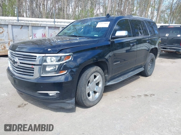 2015 Chevrolet Tahoe LTZ with VIN 1GNSKCKC8FR514671, listed as a IAAI auction lot 42157084 with 182,665 mi miles and . Bid and sale history available at DreamBid. Image 18.
