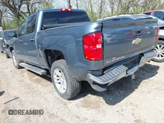 2014 Chevrolet Silverado 1500 LT with VIN 3GCUKREH9EG313565, listed as a IAAI auction lot 42003086 with 112,322 mi miles and . Bid and sale history available at DreamBid. Image 3.