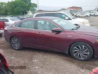 2020 Honda Insight Touring z VIN 19XZE4F93LE010040, wystawiony jako IAAI lot #42240572 z przebiegiem 52 299 mil mil oraz . Historia ofert i sprzedaży dostępna na DreamBid. Obrazek 13.