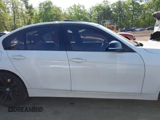 2013 BMW 3 Series 335i xDrive with VIN WBA3B9C54DF587421, listed as a IAAI auction lot 42165857 with 142,331 mi miles. Bid and sale history available at carsss.com. Image 13.