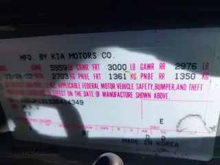 2003 Kia Sedona LX with VIN KNDUP131536414349, listed as a IAAI auction lot 41836104 with 70,130 mi miles. Bid and sale history available at carsss.com. Image 9.