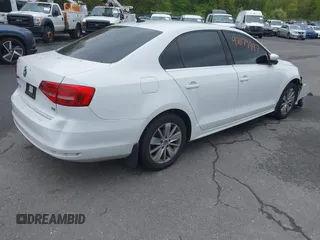 2015 Volkswagen Jetta SE with VIN 3VWD17AJ5FM305415, listed as a IAAI auction lot 42179447 with 154,535 mi miles and . Bid and sale history available at DreamBid. Image 4.