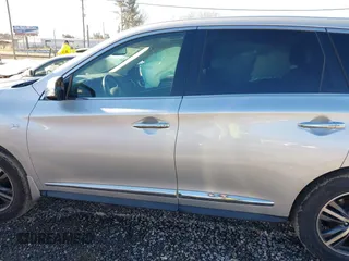 2019 Infiniti QX60 LUXE with VIN 5N1DL0MN3KC555343, listed as a IAAI auction lot 41331200 with 103,085 mi miles. Bid and sale history available at carsss.com. Image 14.