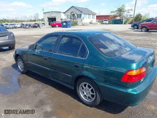 2000 Honda Civic LX with VIN 1HGEJ6672YL022393, listed as a IAAI auction lot 41968262 with 231,261 mi miles. Bid and sale history available at carsss.com. Image 3.