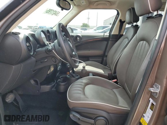 2015 MINI Countryman with VIN WMWZB3C55FWR46334, listed as a Copart auction lot 55421795 with 33,135 mi miles and Salvage Title. Bid and sale history available at DreamBid. Image 7.