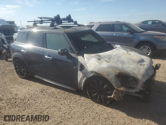 2017 MINI Countryman Cooper with VIN WMZYS7C30H3E06885, listed as a Copart auction lot 61150455 with Not provided miles and Salvage title. Bid and sale history available at DreamBid. Image 4.