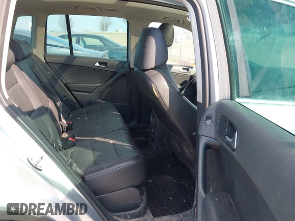 2011 Volkswagen Tiguan SE with VIN WVGBV7AX2BW562055, listed as a IAAI auction lot 41642084 with 175,407 mi miles and . Bid and sale history available at DreamBid. Image 8.