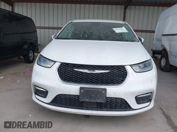 2023 Chrysler Pacifica Touring L with VIN 2C4RC1BG6PR550575, listed as a IAAI auction lot 42576498 with 54,373 mi miles and . Bid and sale history available at DreamBid. Image 6.