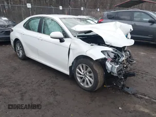 2023 Toyota Camry LE z VIN 4T1C11AK4PU185653, wystawiony jako IAAI lot #41488784 z przebiegiem Nie podano mil oraz . Historia ofert i sprzedaży dostępna na DreamBid. Obrazek 1.