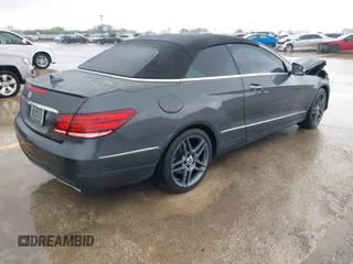 2015 Mercedes-Benz E with VIN WDDKK6FF5FF301120, listed as a IAAI auction lot 41904856 with 122,489 mi miles. Bid and sale history available at carsss.com. Image 4.