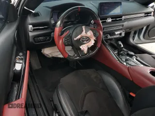 2022 Toyota Supra 3.0 with VIN WZ1DB0C09NW047931, listed as a Copart auction lot 59527955 with 61,941 mi miles and Salvage title. Bid and sale history available at DreamBid. Image 8.