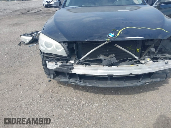 2015 BMW 7 Series 740Li xDrive with VIN WBAYF4C55FD874116, listed as a IAAI auction lot 41877144 with 156,280 mi miles. Bid and sale history available at carsss.com. Image 19.