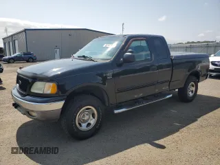 2004 Ford F-150 XL with VIN 2FTRX18W24CA66131, listed as a Copart auction lot 60106085 with 202,542 mi miles and Salvage title. Bid and sale history available at DreamBid. Image 1.