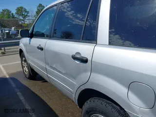 2004 Honda Pilot EX with VIN 2HKYF18594H519175, listed as a IAAI auction lot 41899345 with 268,718 mi miles. Bid and sale history available at carsss.com. Image 6.