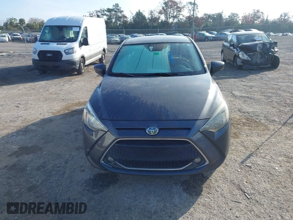 2019 Toyota Yaris Sedan L with VIN 3MYDLBYVXKY506966, listed as a IAAI auction lot 41455800 with 106,284 mi miles. Bid and sale history available at carsss.com. Image 12.