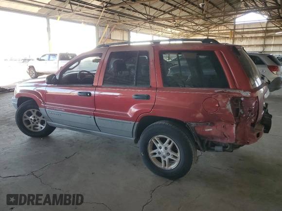 2002 Jeep Grand Cherokee with VIN 1J4GX38S52C166298, listed as a Copart auction lot 80655884 with 212,113 mi miles and Salvage title. Bid and sale history available at DreamBid. Image 2.