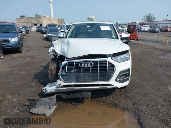 2021 Audi Q5 Premium Plus z VIN WA1BAAFYXM2050028, wystawiony jako IAAI lot #42479898 z przebiegiem 39 015 mil mil oraz . Historia ofert i sprzedaży dostępna na DreamBid. Obrazek 12.