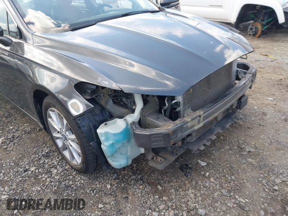 2017 Ford Fusion Hybrid SE z VIN 3FA6P0LU3HR260558, wystawiony jako IAAI lot #42657176 z przebiegiem 161 183 mil mil oraz . Historia ofert i sprzedaży dostępna na DreamBid. Obrazek 19.