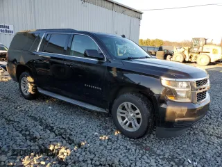 2015 Chevrolet Suburban LT with VIN 1GNSKJKC8FR180436, listed as a Copart auction lot 71109202 with 74,608 mi miles and . Bid and sale history available at DreamBid. Image 4.