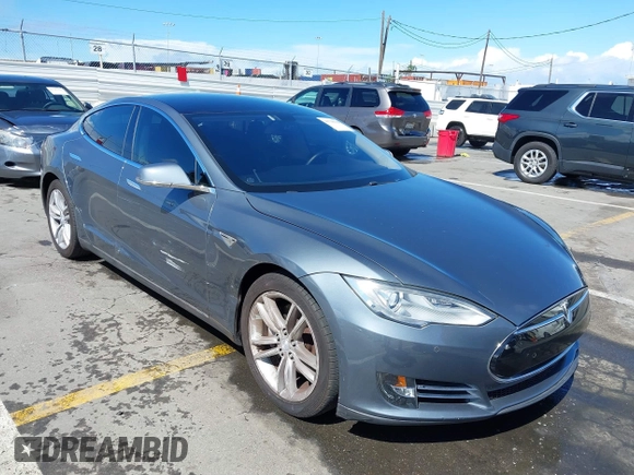 2014 Tesla Model S 60 with VIN 5YJSA1S15EFP29010, listed as a IAAI auction lot 41798180 with 142,754 mi miles and . Bid and sale history available at DreamBid. Image 1.