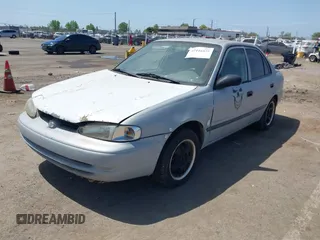 2000 Chevrolet Prizm LSi z VIN 1Y1SK5287YZ408470, wystawiony jako IAAI lot #42116829 z przebiegiem 237 089 mil mil oraz . Historia ofert i sprzedaży dostępna na DreamBid. Obrazek 2.