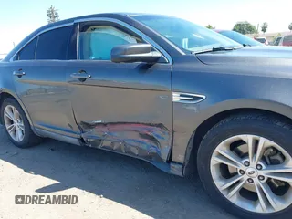 2015 Ford Taurus SEL z VIN 1FAHP2E83FG184588, wystawiony jako IAAI lot #42262166 z przebiegiem 116 392 mil mil oraz . Historia ofert i sprzedaży dostępna na DreamBid. Obrazek 6.