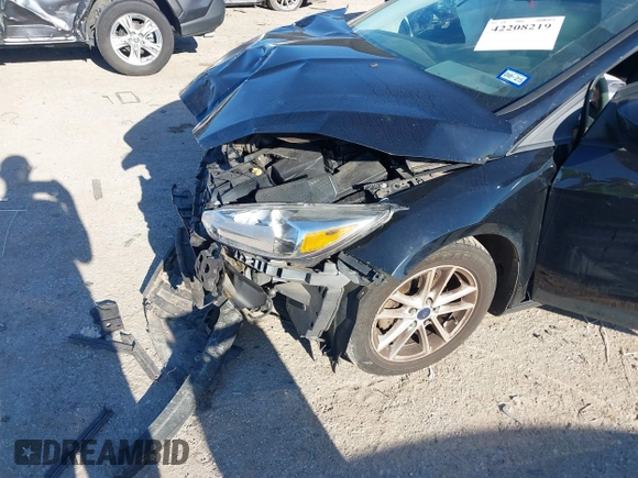 2018 Ford Focus SE with VIN 1FADP3F25JL222689, listed as a IAAI auction lot 42208219 with 127,875 mi miles and . Bid and sale history available at DreamBid. Image 6.
