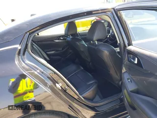 2021 Nissan Maxima SV with VIN 1N4AA6CV4MC506744, listed as a IAAI auction lot 42150465 with 70,056 mi miles and . Bid and sale history available at DreamBid. Image 8.