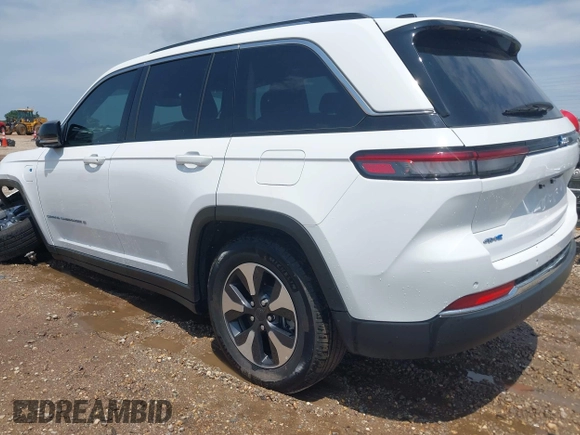 2023 Jeep Grand Cherokee with VIN 1C4RJYB63PC649000, listed as a IAAI auction lot 42306975 with 29,948 mi miles and . Bid and sale history available at DreamBid. Image 3.