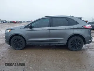 2023 Ford Edge SE z VIN 2FMPK4G95PBA41278, wystawiony jako IAAI lot #41964995 z przebiegiem 21 079 mil mil oraz . Historia ofert i sprzedaży dostępna na DreamBid. Obrazek 14.